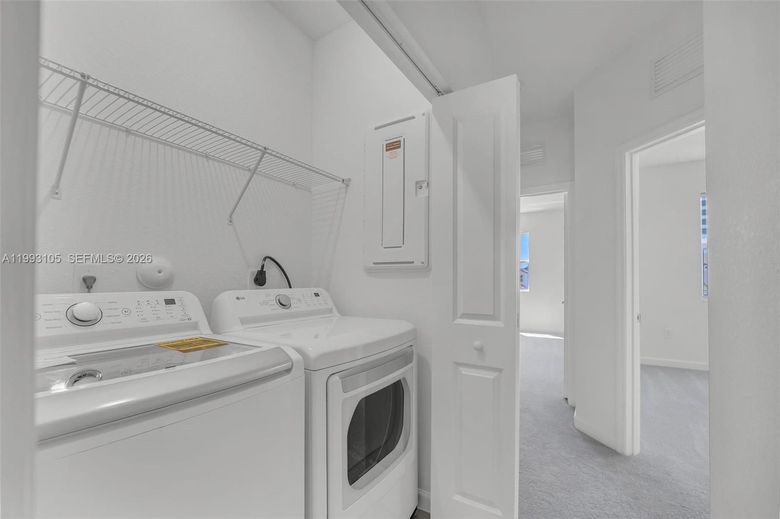 2425 Southeast 28th Drive, Unit 2425 Homestead, FL 33035 - Photo 27 of 98 a utility room with dryer and washer