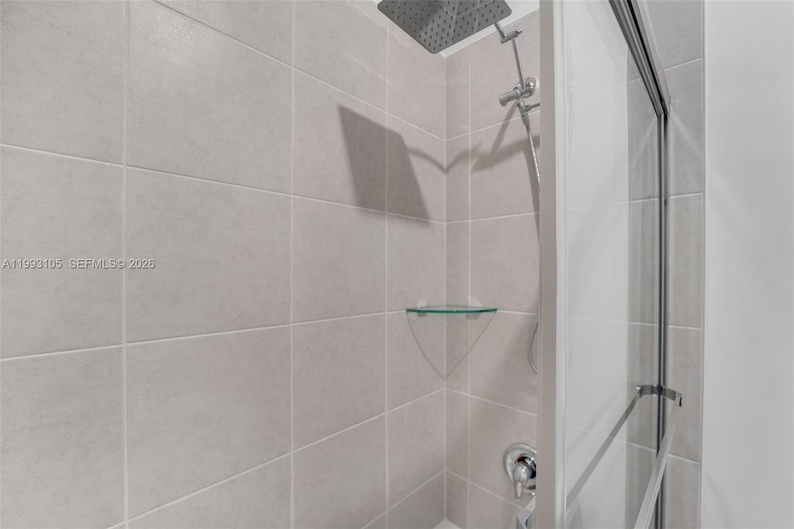 2425 Southeast 28th Drive, Unit 2425 Homestead, FL 33035 - Photo 33 of 98 a bathroom with a shower