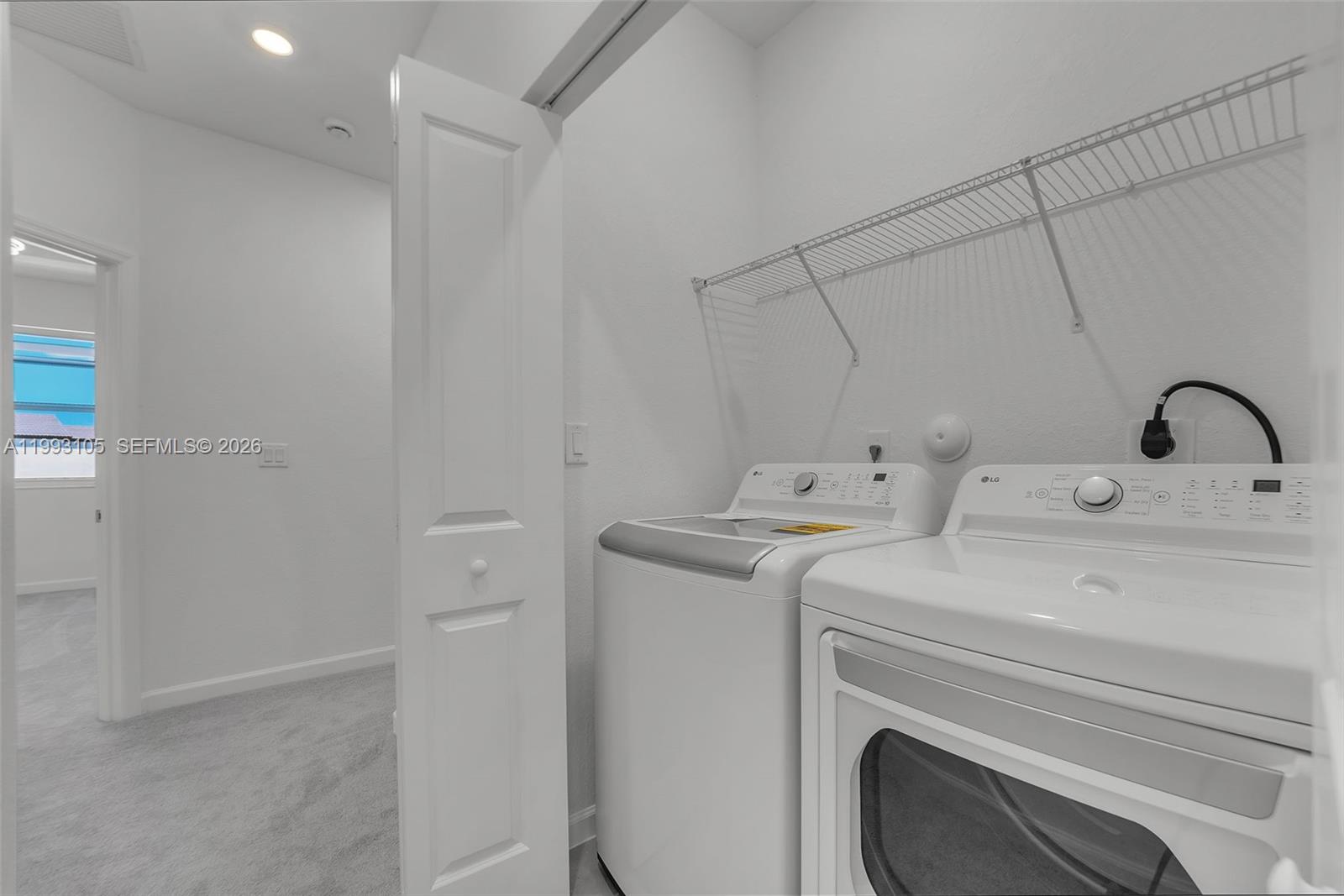 2425 Southeast 28th Drive, Unit 2425 Homestead, FL 33035 - Photo 41 of 98 a utility room with dryer and washer
