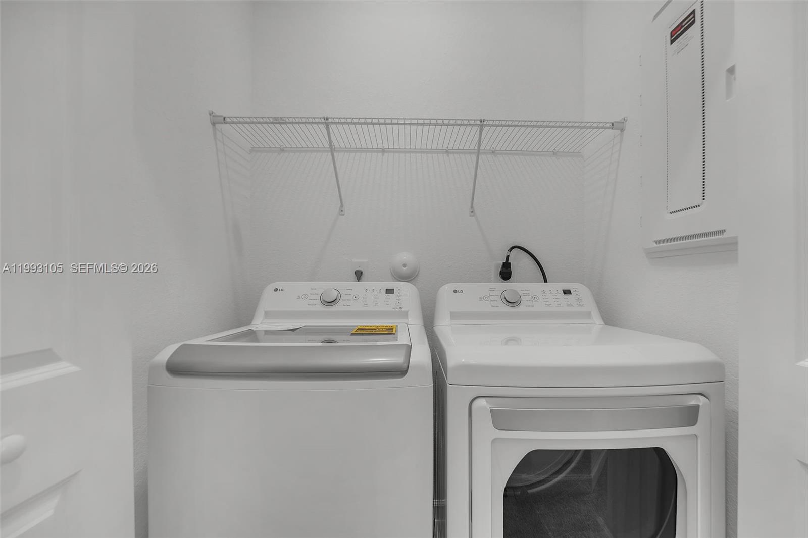 2425 Southeast 28th Drive, Unit 2425 Homestead, FL 33035 - Photo 6 of 98 a utility room with dryer and washer