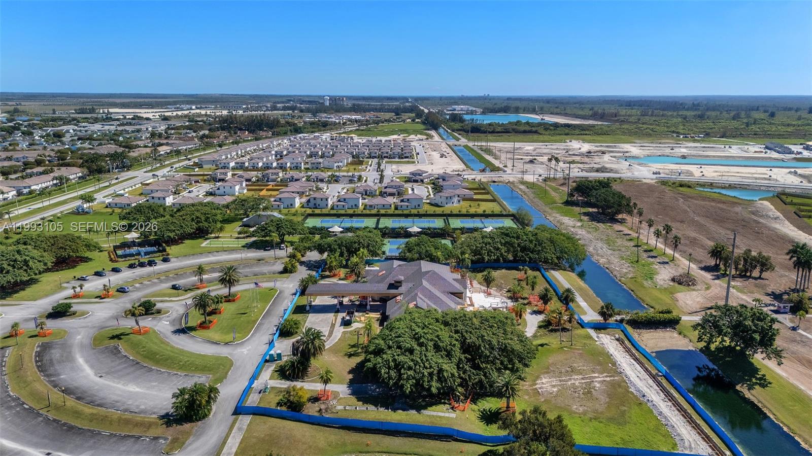 2425 Southeast 28th Drive, Unit 2425 Homestead, FL 33035 - Photo 72 of 98 an aerial view of residential houses with outdoor space