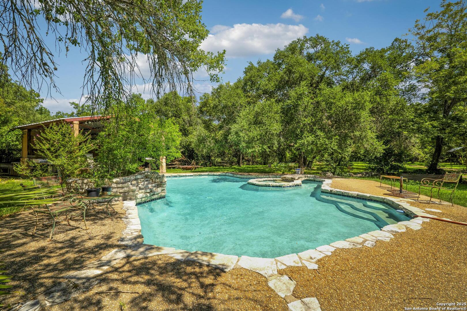 10855 Jericho Road Helotes, TX 78023 - Photo 42 of 59 a view of a backyard