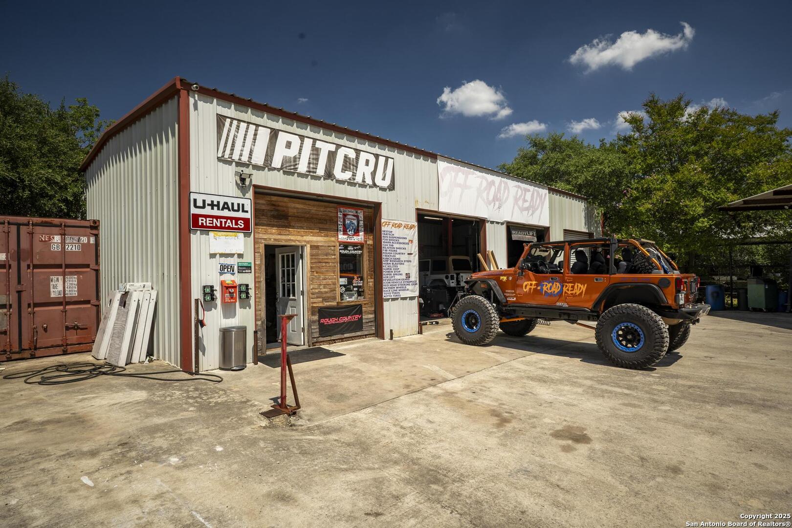 10855 Jericho Road Helotes, TX 78023 - Photo 57 of 59 a view of a car park in front of house