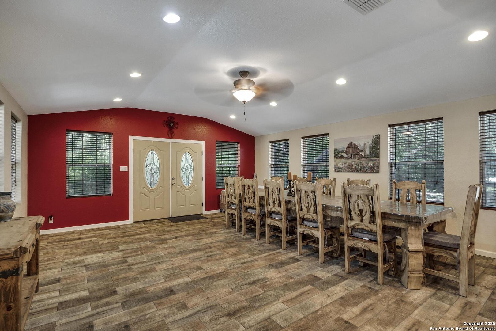 10855 Jericho Road Helotes, TX 78023 - Photo 6 of 59 a view of a dining room with furniture window and outside view