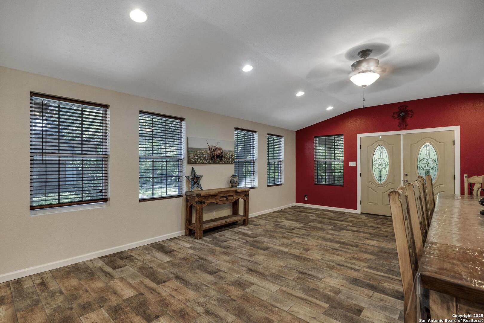 10855 Jericho Road Helotes, TX 78023 - Photo 7 of 59 a view of a livingroom with furniture window and wooden floor