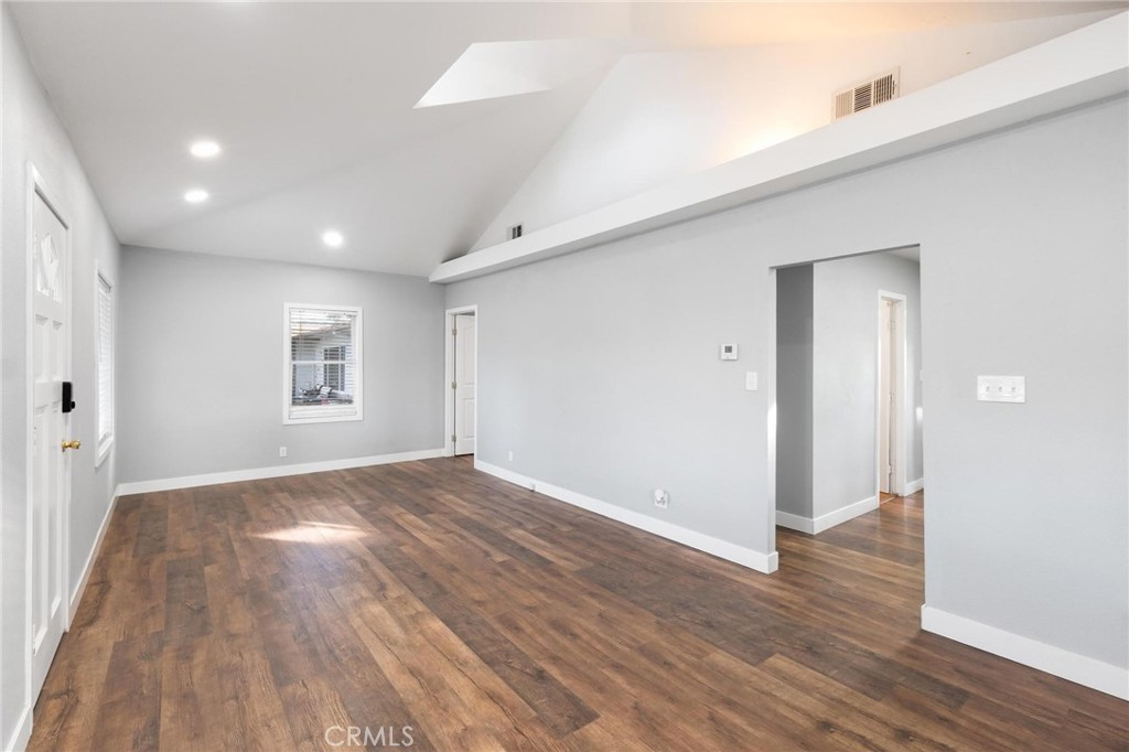 34789 Wildwood Canyon Road Yucaipa, CA 92399 - Photo 14 of 52 wooden floor in an empty room with a window
