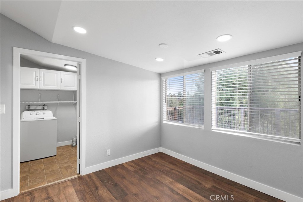 34789 Wildwood Canyon Road Yucaipa, CA 92399 - Photo 31 of 52 a view of an empty room with a window
