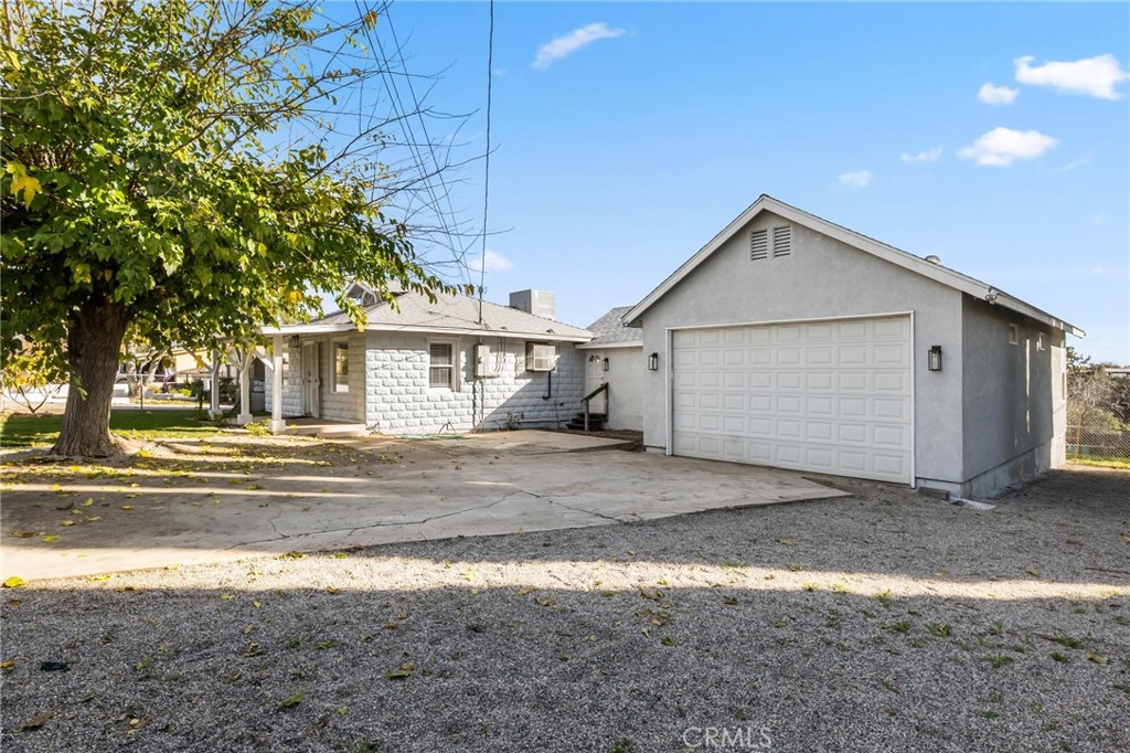 34789 Wildwood Canyon Road Yucaipa, CA 92399 - Photo 4 of 52 a view of a house with a yard