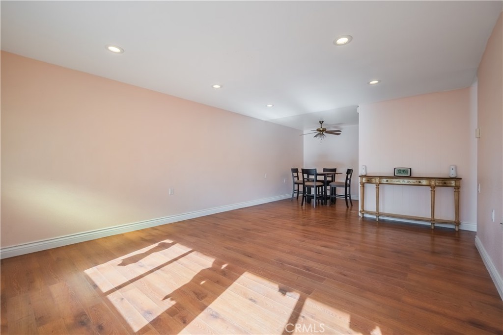 2103 Ronda Granada, Unit B Laguna Woods, CA 92637 - Photo 11 of 22 a view of a kitchen with dining table and chairs
