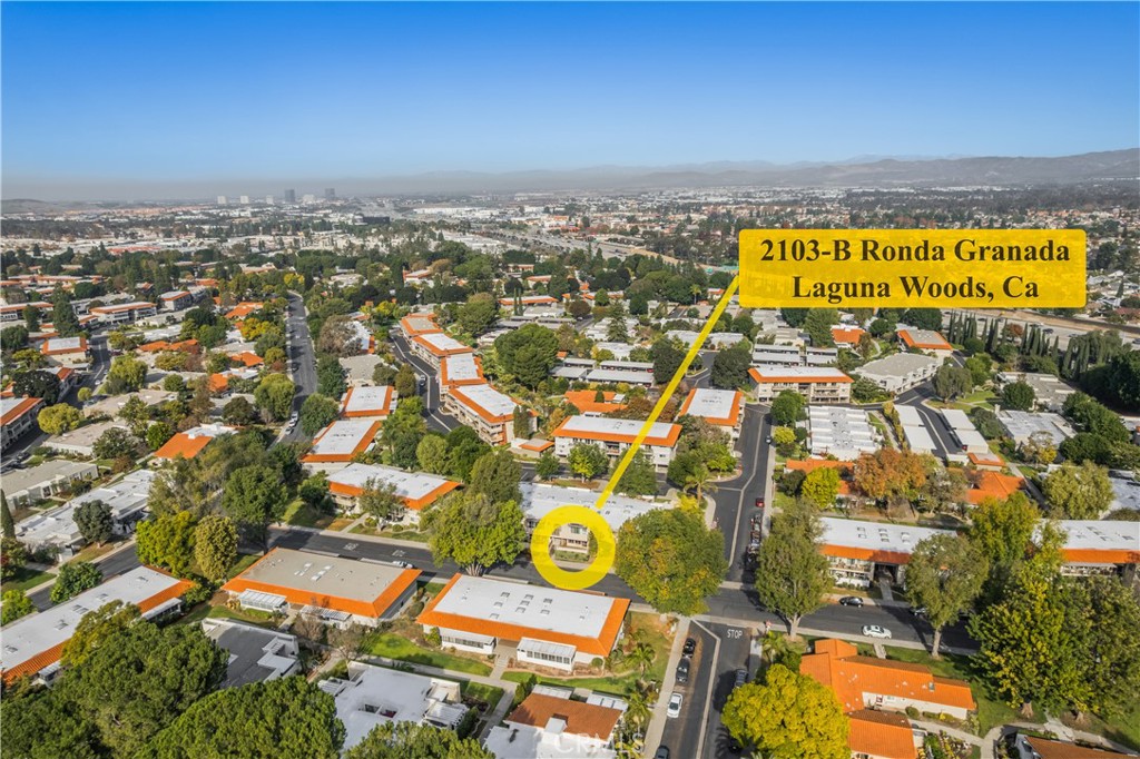 2103 Ronda Granada, Unit B Laguna Woods, CA 92637 - Photo 20 of 22 an aerial view of residential building with swimming pool and outdoor space
