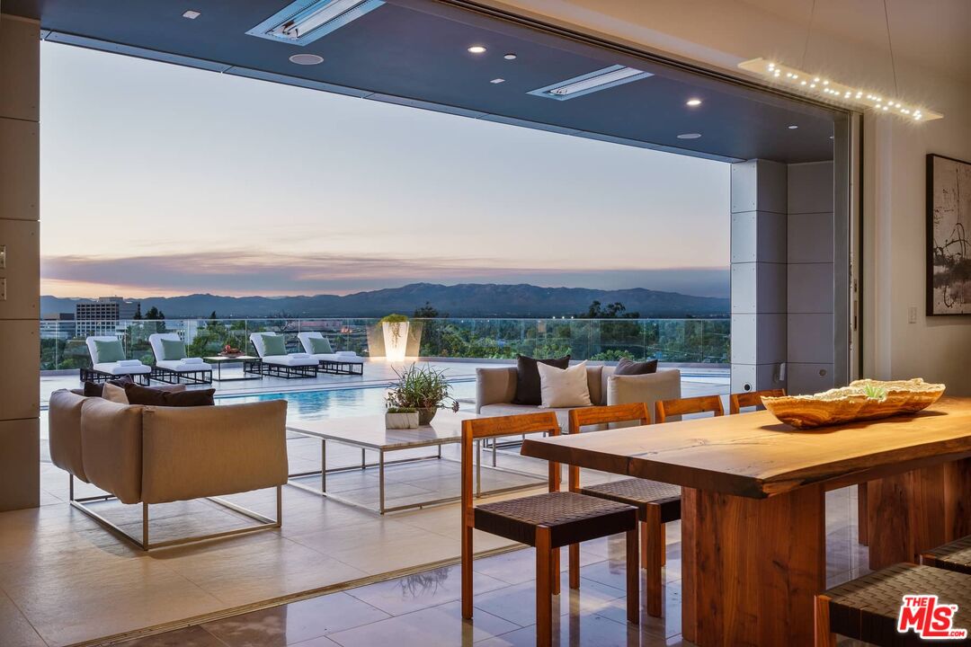 4634 Libbit Avenue Encino, CA 91436 - Photo 2 of 40 a outdoor space with tables and chairs