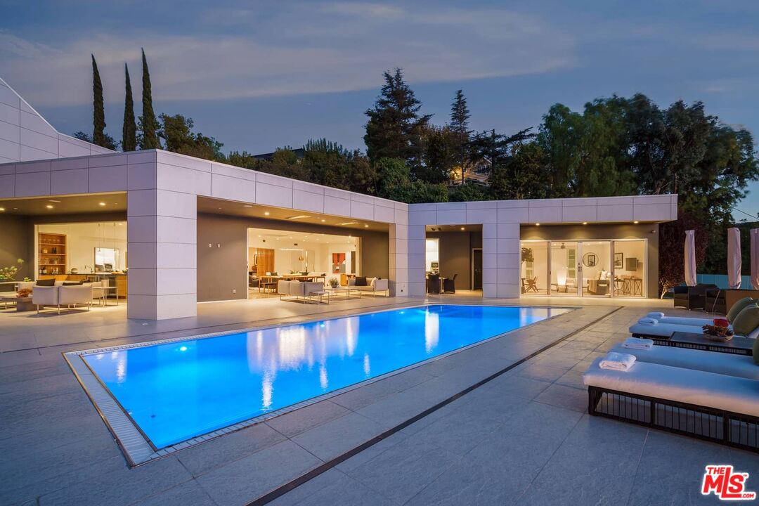 4634 Libbit Avenue Encino, CA 91436 - Photo 5 of 40 a view of swimming pool with seating area