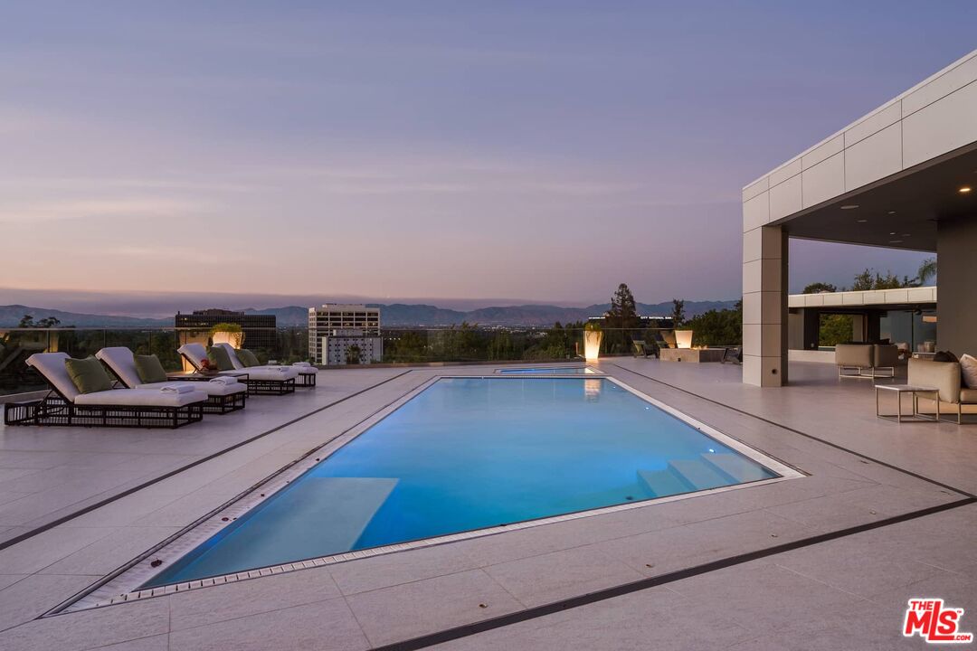 4634 Libbit Avenue Encino, CA 91436 - Photo 7 of 40 a view of a living room and kitchen