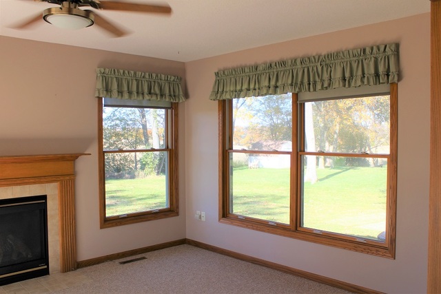 1705 Ridgewood Drive Morrison, IL 61270 - Photo 8 of 21 a view of an empty room with a window