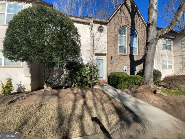 304 Bridge Lane Smyrna, GA 30082 - Photo 4 of 6 a view of a house with a yard