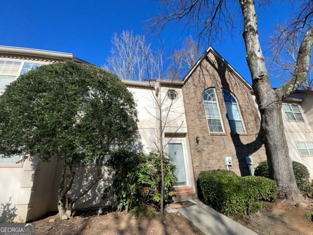 304 Bridge Lane Smyrna, GA 30082 - Photo 6 of 6 a view of a house with a small yard