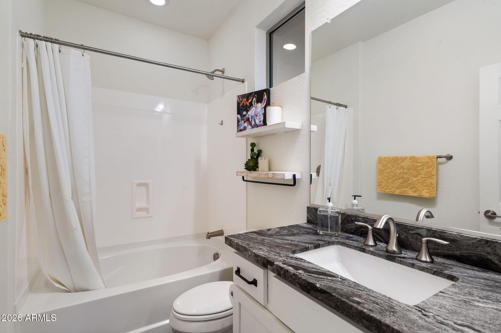 4638 Cactus Wren Road Wickenburg, AZ 85390 - Photo 16 of 31 a bathroom with a granite countertop sink toilet and shower