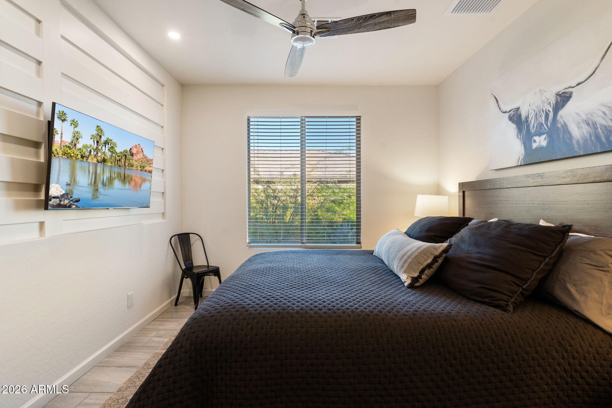 4638 Cactus Wren Road Wickenburg, AZ 85390 - Photo 18 of 31 a bedroom with furniture and a window