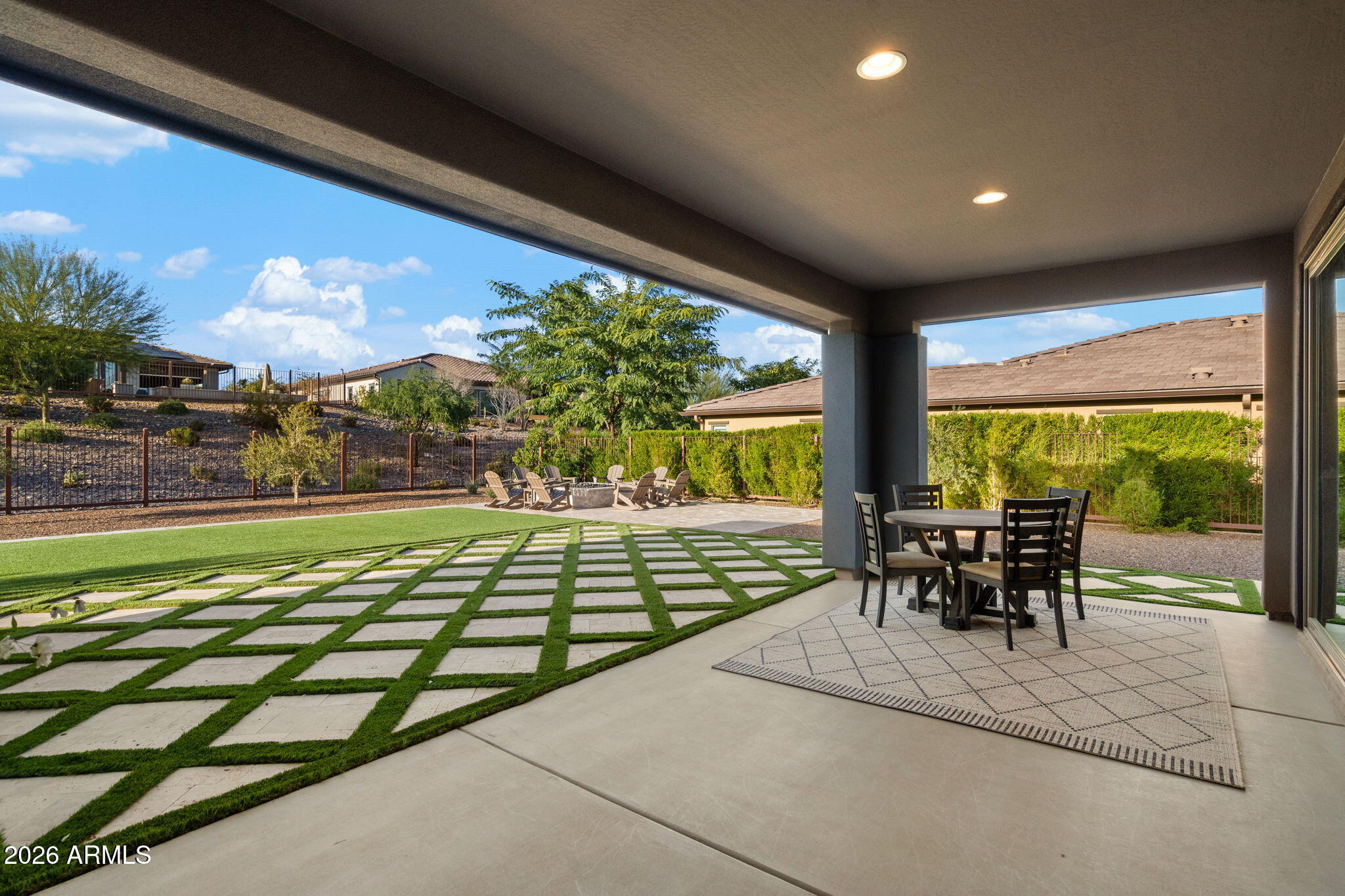 4638 Cactus Wren Road Wickenburg, AZ 85390 - Photo 19 of 31 a dining room with furniture and a large window