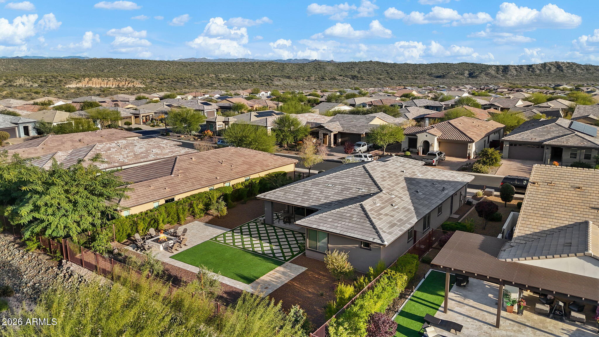 4638 Cactus Wren Road Wickenburg, AZ 85390 - Photo 25 of 31 an aerial view of residential houses with outdoor space