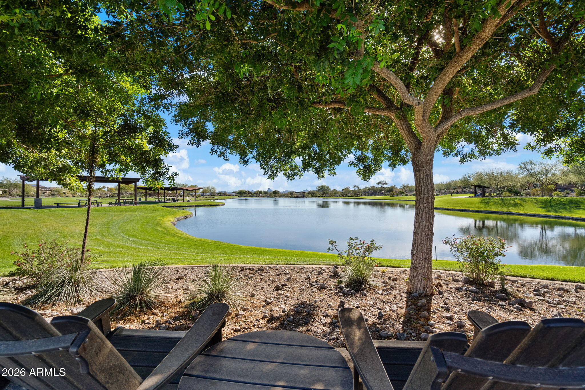 4638 Cactus Wren Road Wickenburg, AZ 85390 - Photo 28 of 31 a view of a lake with a ocean view