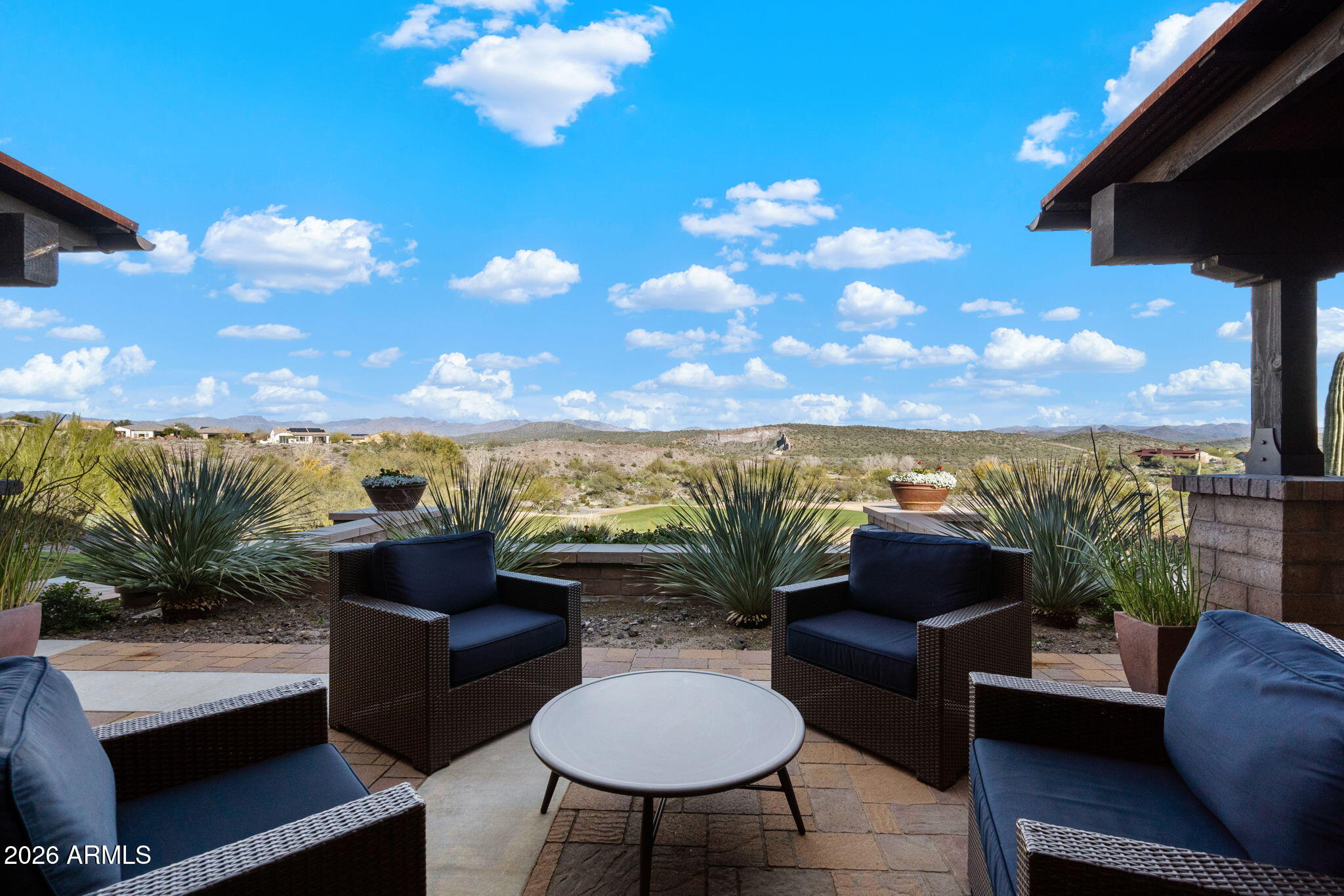 4638 Cactus Wren Road Wickenburg, AZ 85390 - Photo 31 of 31 a view of a chairs and table in the balcony