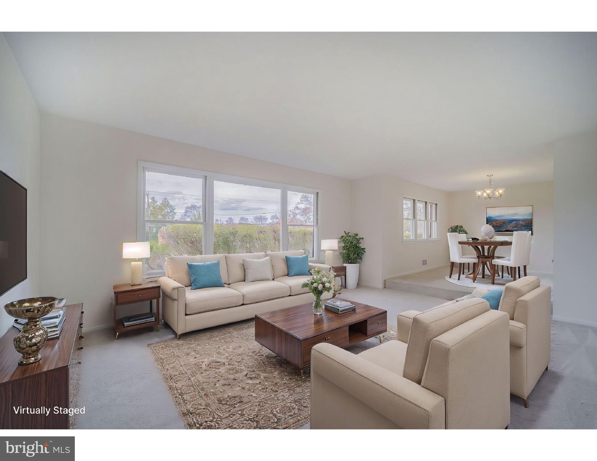 5017 Ravensworth Road Annandale, VA 22003 - Photo 11 of 40 a living room with furniture and a large window