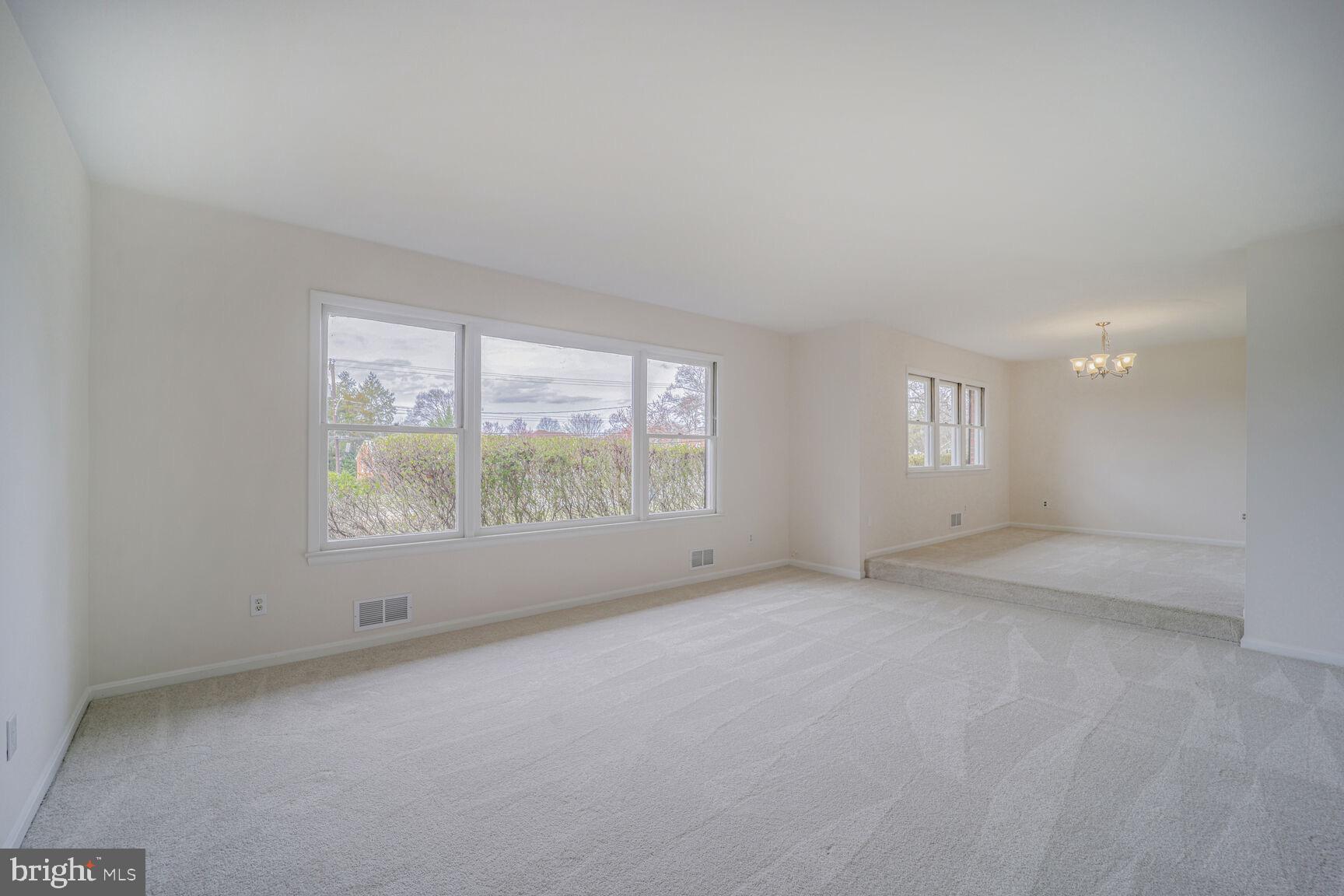 5017 Ravensworth Road Annandale, VA 22003 - Photo 12 of 40 an empty room with windows