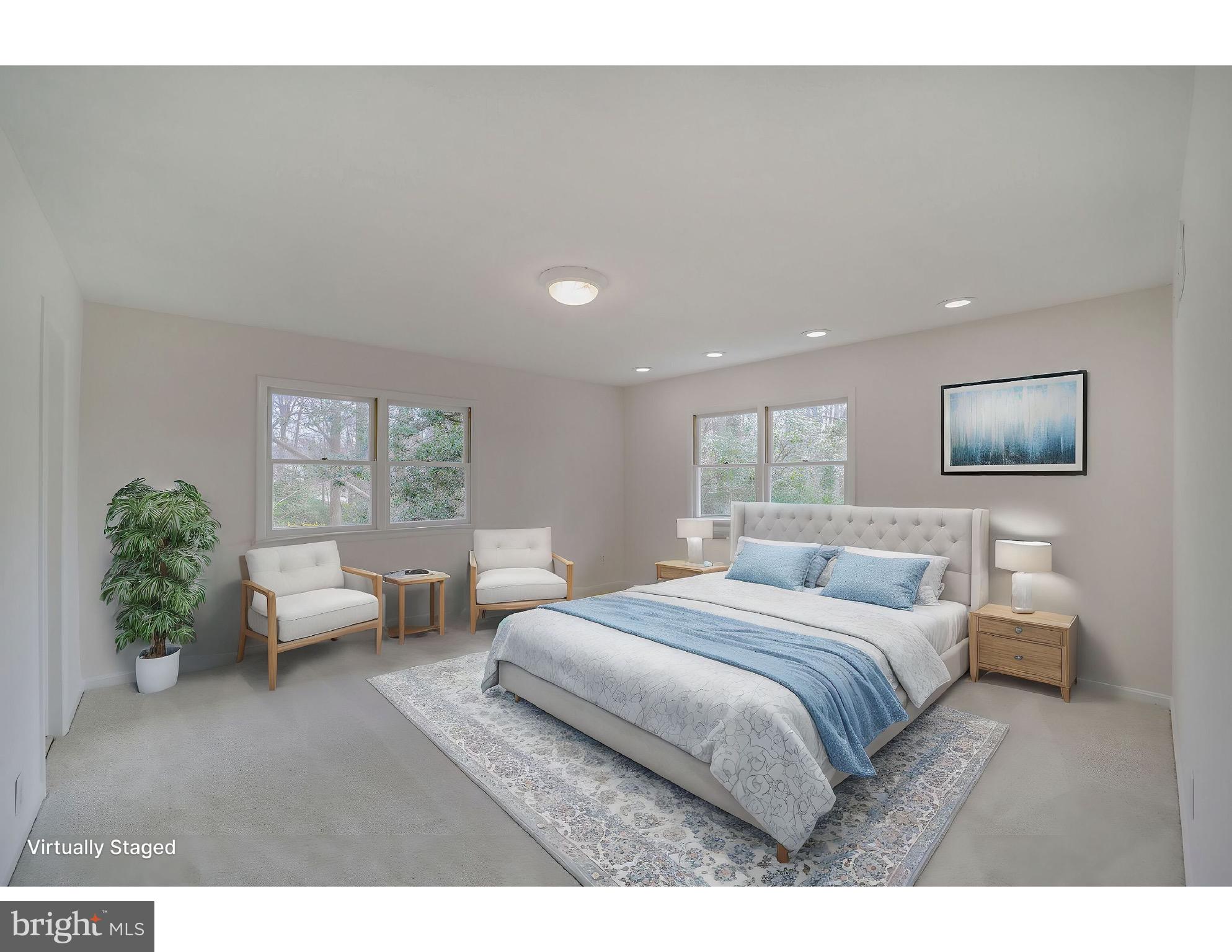 5017 Ravensworth Road Annandale, VA 22003 - Photo 15 of 40 a bedroom with bed and a couch