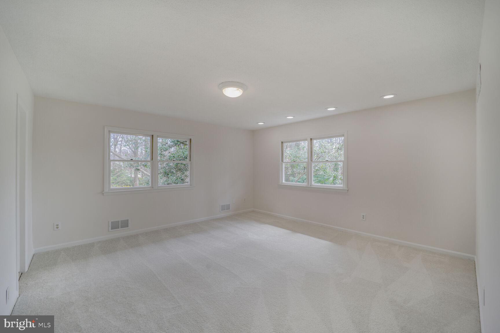 5017 Ravensworth Road Annandale, VA 22003 - Photo 16 of 40 an empty room with windows