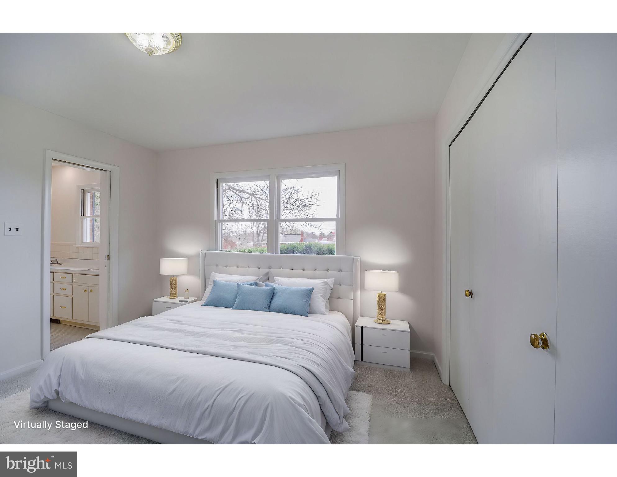 5017 Ravensworth Road Annandale, VA 22003 - Photo 22 of 40 a bedroom with a bed and a window