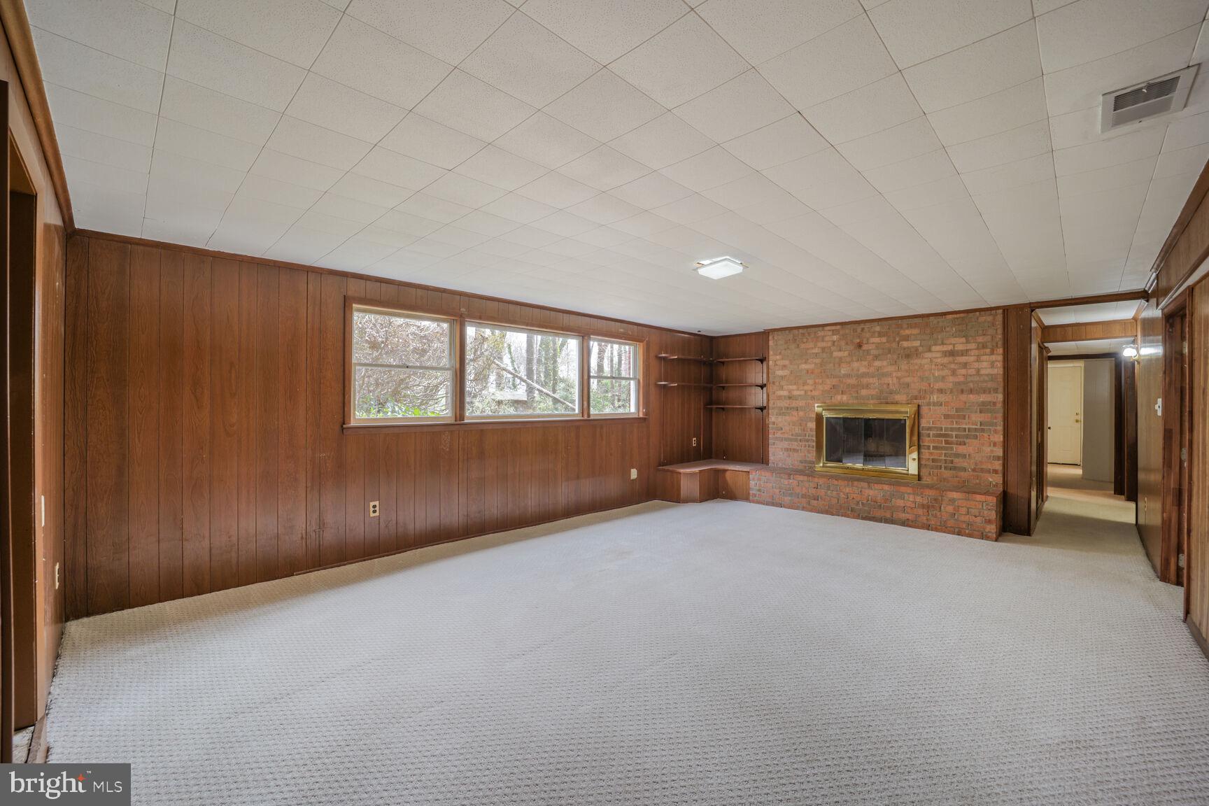 5017 Ravensworth Road Annandale, VA 22003 - Photo 27 of 40 an empty room with windows