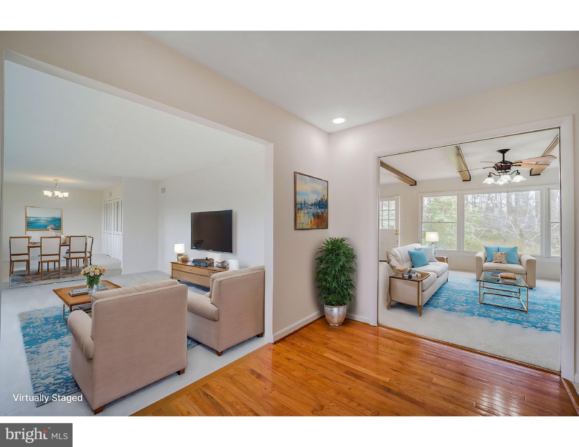 5017 Ravensworth Road Annandale, VA 22003 - Photo 3 of 40 a living room with furniture and a flat screen tv