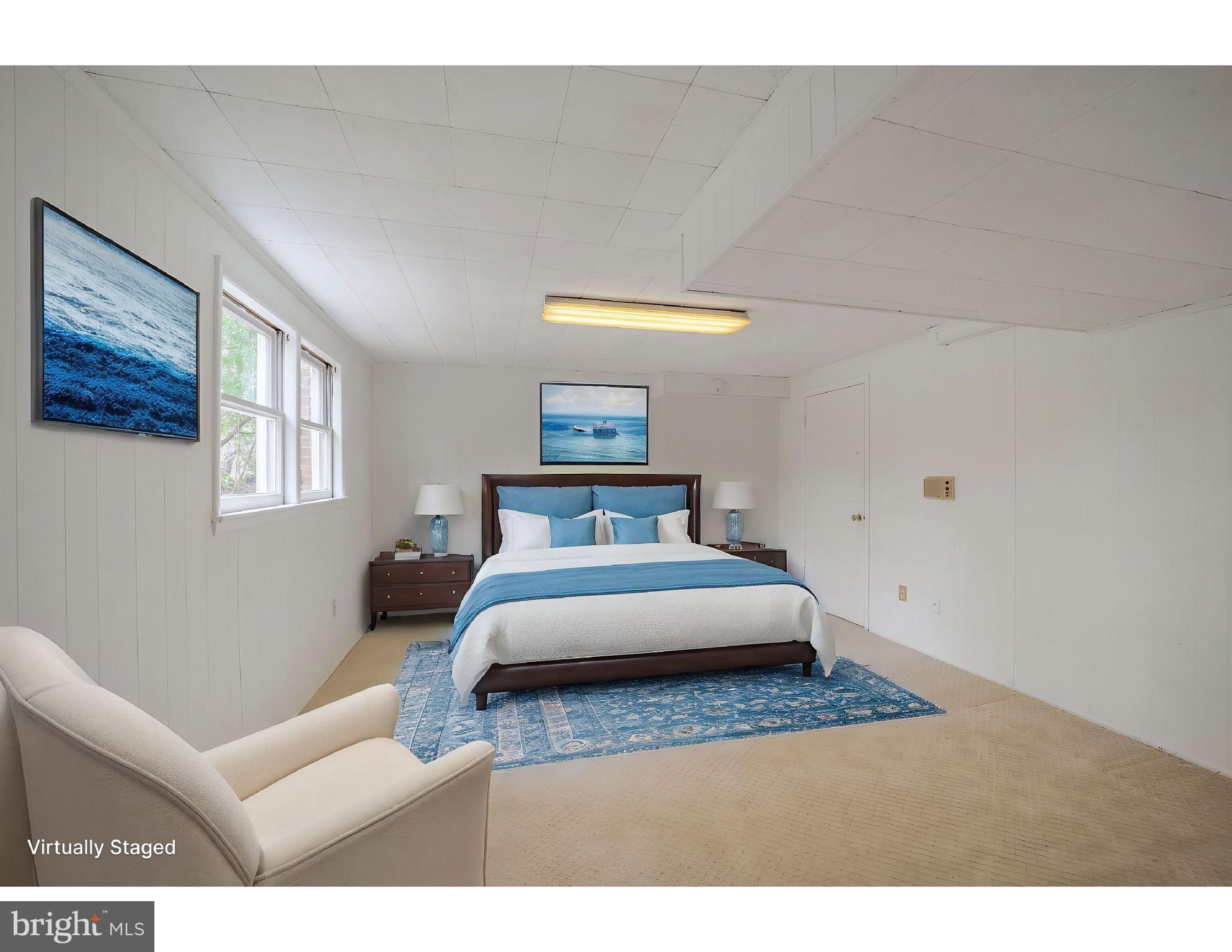 5017 Ravensworth Road Annandale, VA 22003 - Photo 32 of 40 a living room with furniture and a window