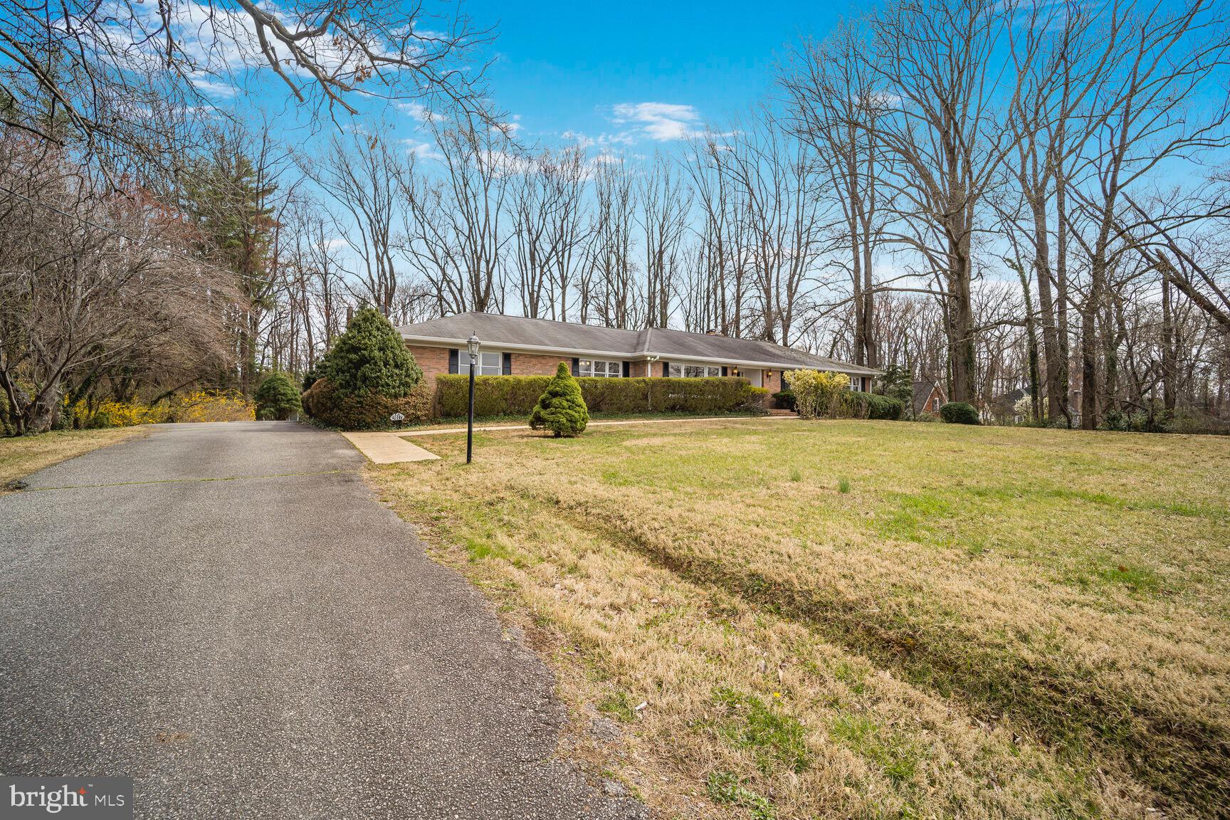 5017 Ravensworth Road Annandale, VA 22003 - Photo 39 of 40 a view of a swimming pool with an outdoor space and seating area