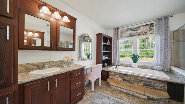 a kitchen with a stove and a sink