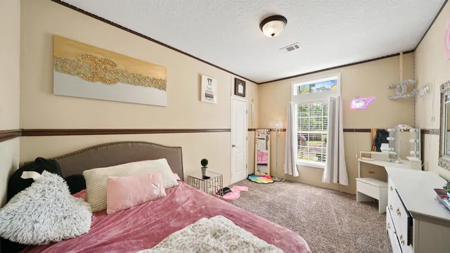 a balcony with furniture and garden view