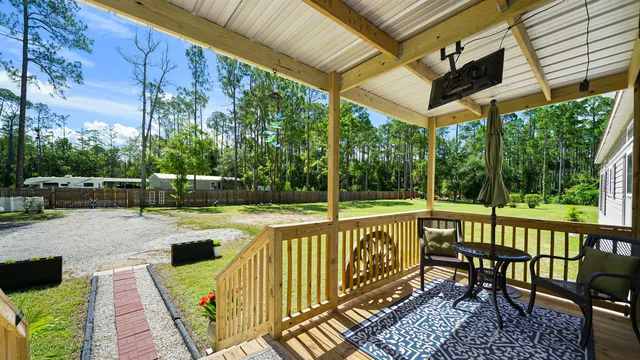a view of a house with a big yard