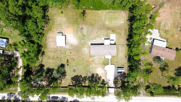 a view of a yard with an outdoor space
