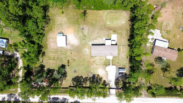 a view of a yard with an outdoor space