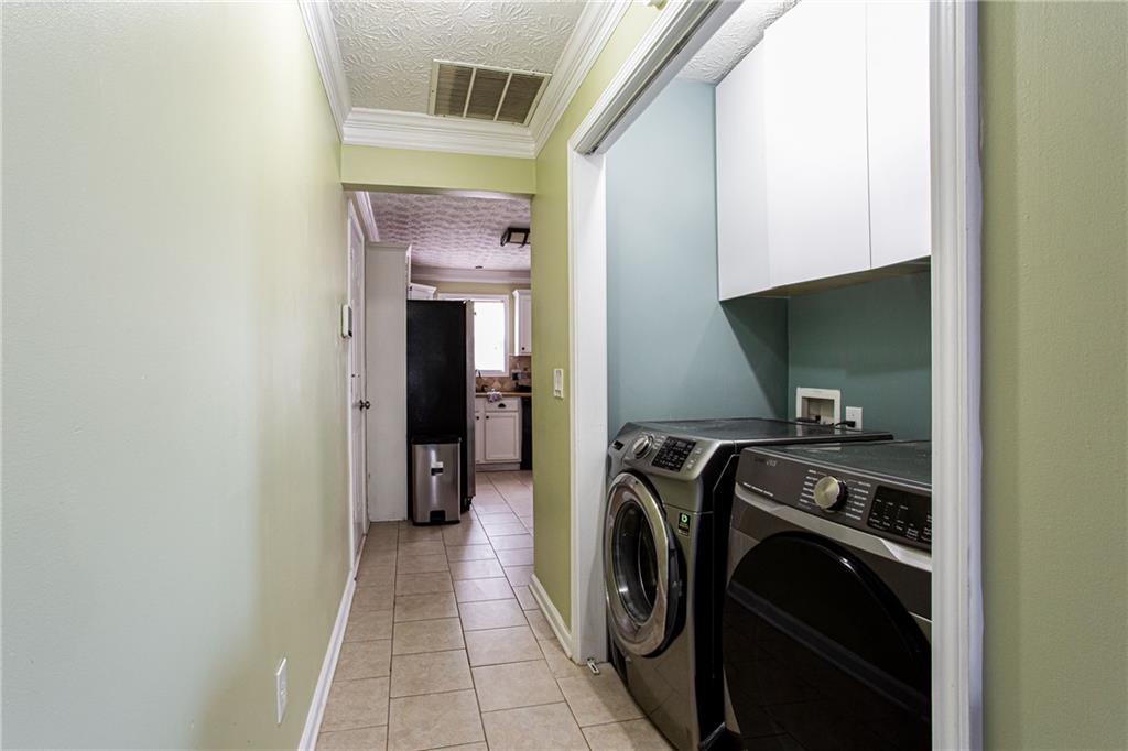 20 Trelawney Run Covington, GA 30016 - Photo 17 of 26 a utility room with dryer and washer