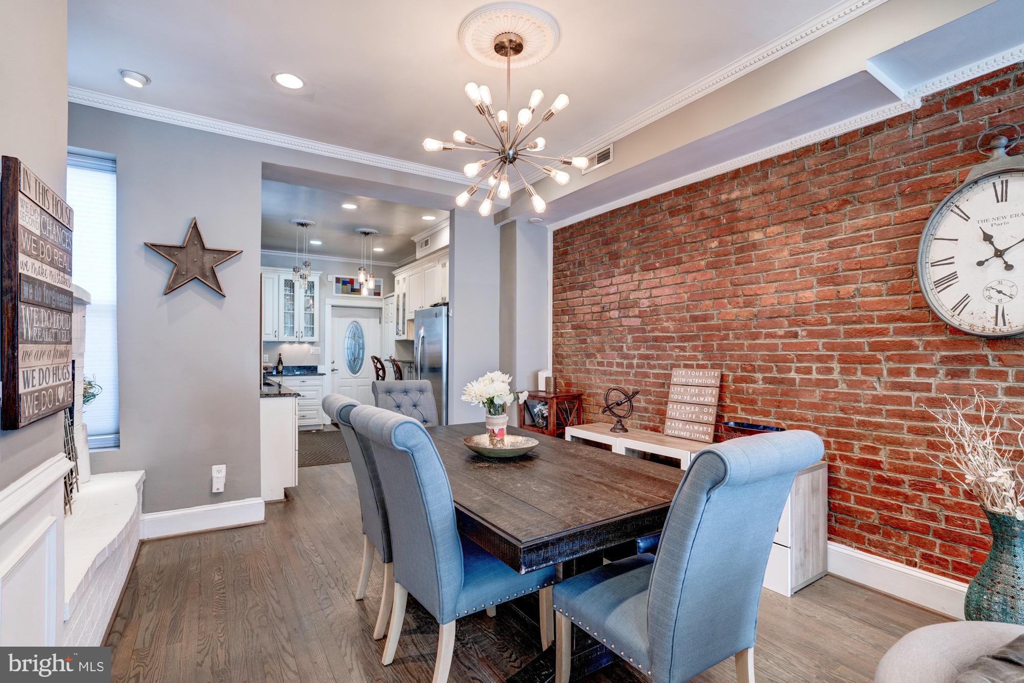 1016 G Street Southeast Washington, DC 20003 - Photo 11 of 56 a view of a dining room with furniture and wooden floor