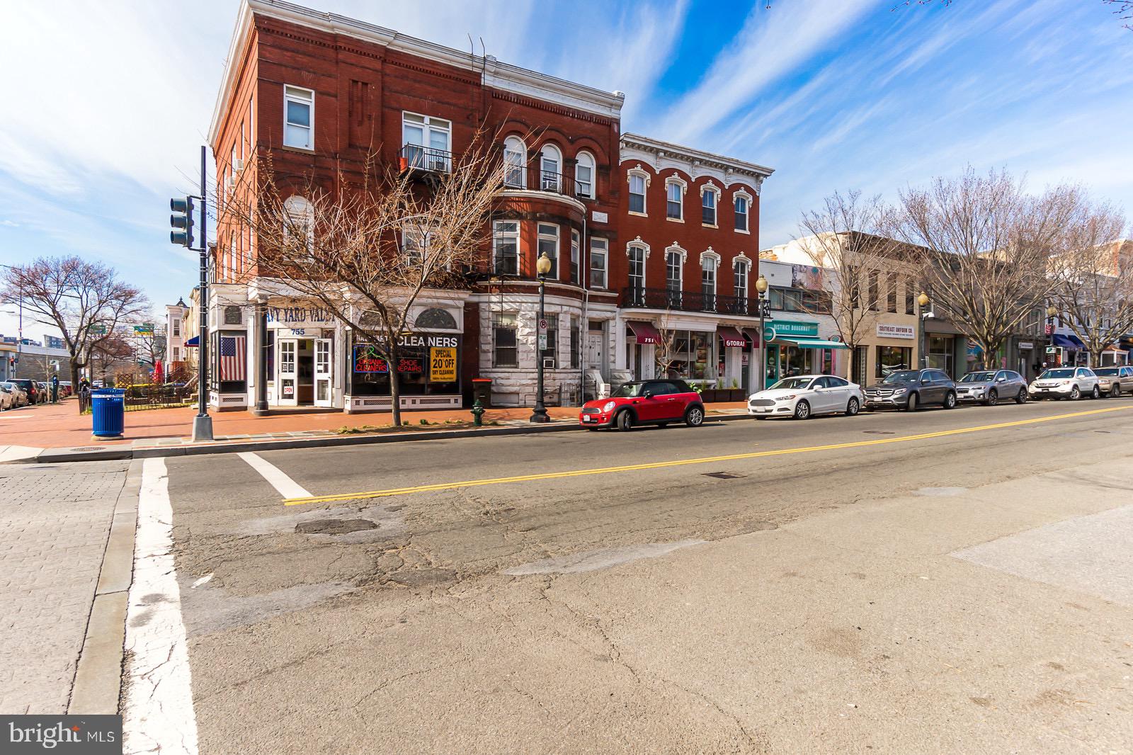 1016 G Street Southeast Washington, DC 20003 - Photo 52 of 56 a front view of a building and a street