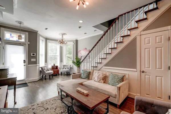 a living room with furniture and a table