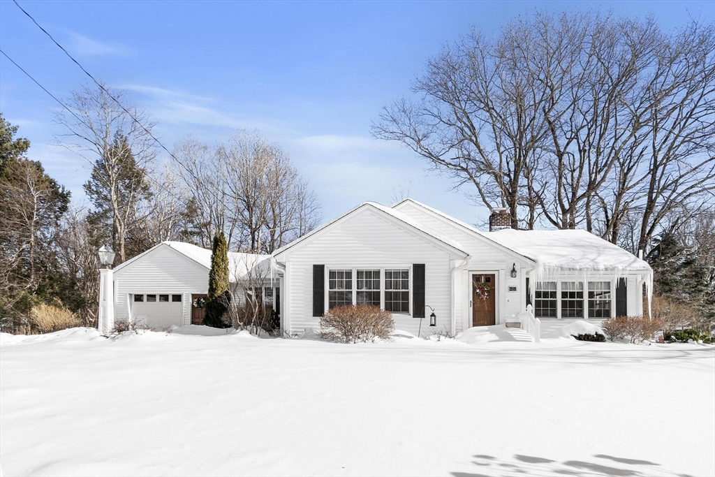 38 Knower Road Westminster, MA 01473 - Photo 1 of 40 a front view of a house with a dirt yard and a large tree