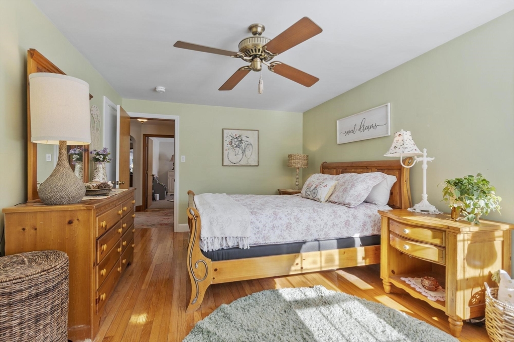 38 Knower Road Westminster, MA 01473 - Photo 12 of 40 a bedroom with a bed and wooden floor
