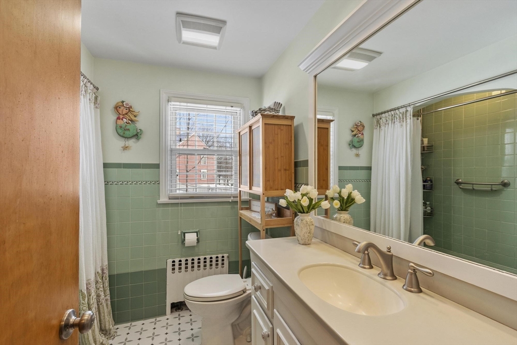 38 Knower Road Westminster, MA 01473 - Photo 14 of 40 a bathroom with a granite countertop toilet sink and mirror