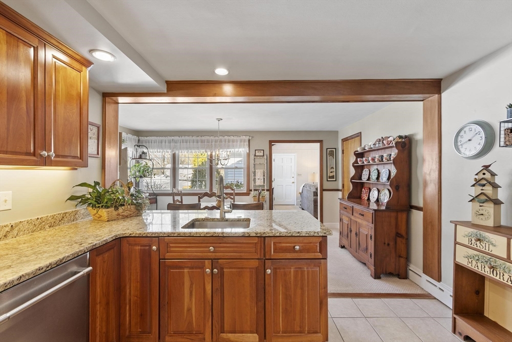 38 Knower Road Westminster, MA 01473 - Photo 23 of 40 a kitchen with stainless steel appliances granite countertop a refrigerator and a sink