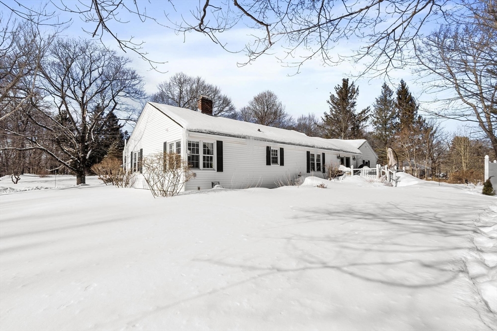 38 Knower Road Westminster, MA 01473 - Photo 39 of 40 a view of house with a yard covered in snow
