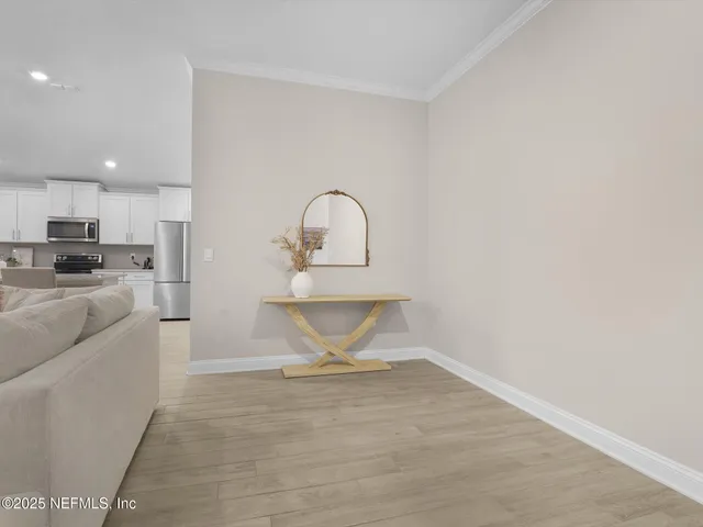 a view of a kitchen with a sink